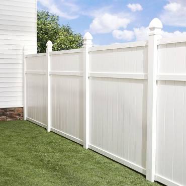 Professional white vinyl fence installation by Fence NZ, enhancing the curb appeal of an Auckland property.