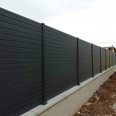 Fence NZ: Stylish Tongue & Groove fencing providing complete privacy and modern elegance for a home.